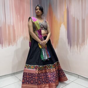 Elegant Black Chaniya Choli with Multicolor Patola Border & Mirror Work Blouse – Patchwork Dupatta – Meera’s Lehenga