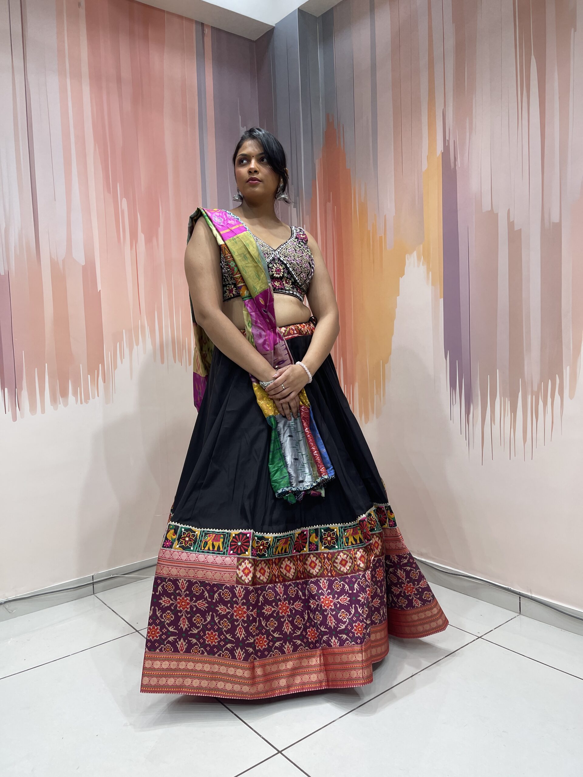 Elegant Black Chaniya Choli with Multicolor Patola Border & Mirror Work Blouse – Patchwork Dupatta – Meera’s Lehenga