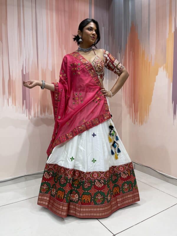 White Chaniya Choli with Multicolor Elephant Patola Border & Mirror Work Blouse – Pink Embroidered Dupatta – Meera’s Lehenga